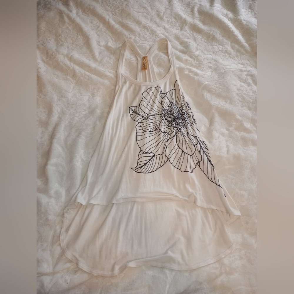 White high low tank with beautiful black bejeweled flower